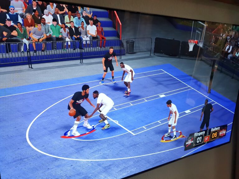 Das Basketballspiel für die XBox vom Fernseher abfotografiert.